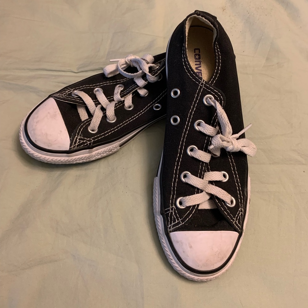 Converse black sneakers, low tops.  Youth size 2.
